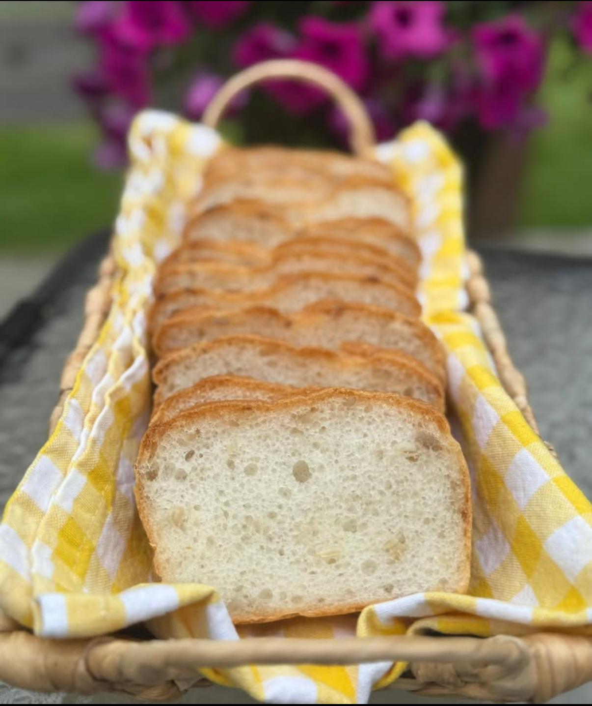 Classic gluten-free sandwich loaf sliced in a basket