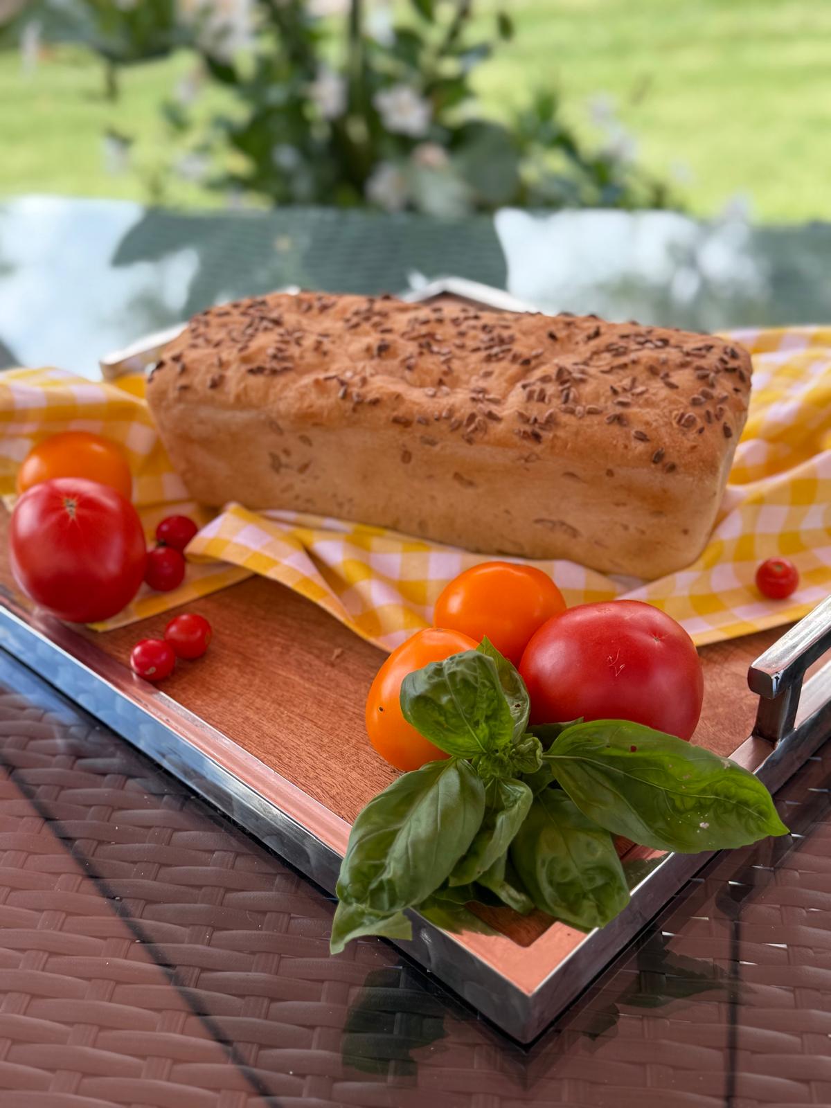 Seeded loaf with tomatoes and basil
