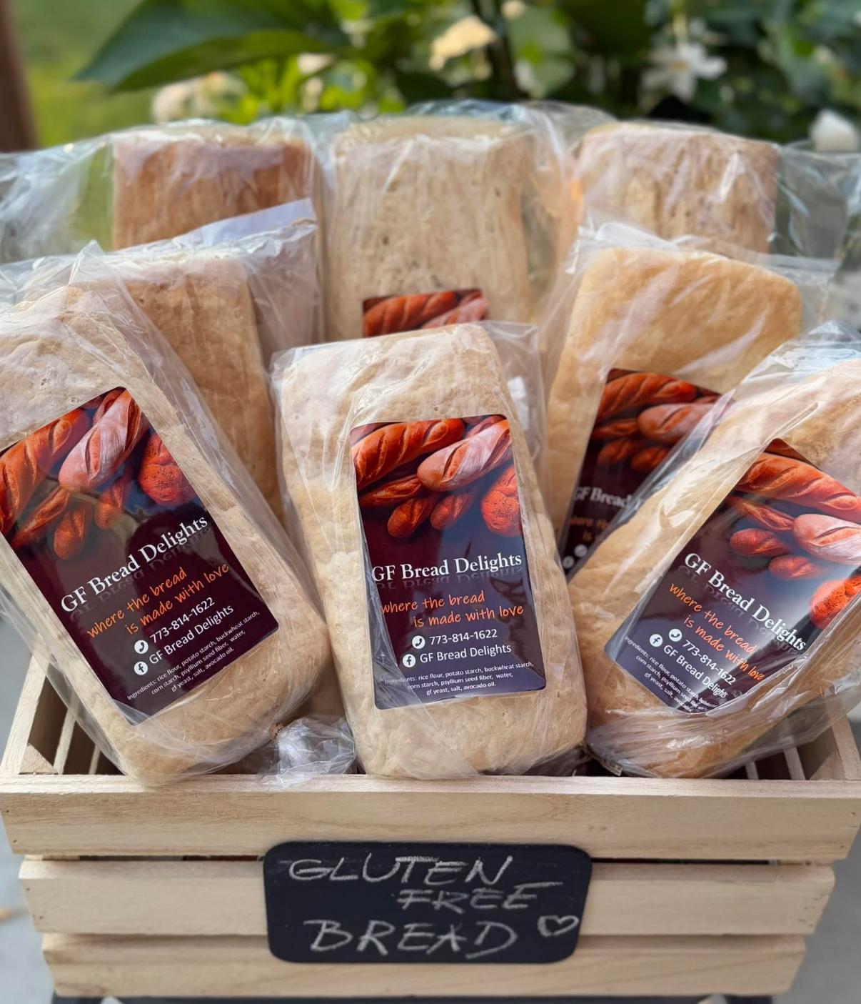 A crate of gluten-free loaves ready for pickup