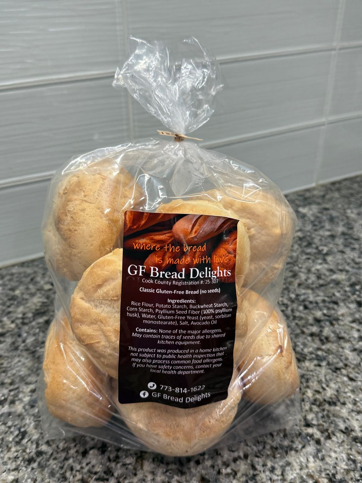 A bag of gluten-free sandwich rolls on the counter